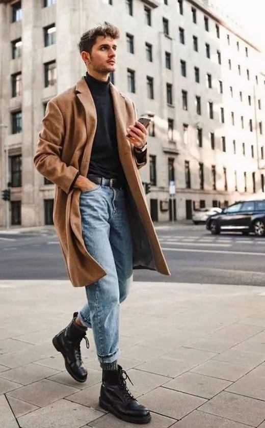 90s_Light_Wash_12-a-winter-look-with-a-black-turtleneck-light-blue-jeans-black-boots-and-a-classic-camel-coat