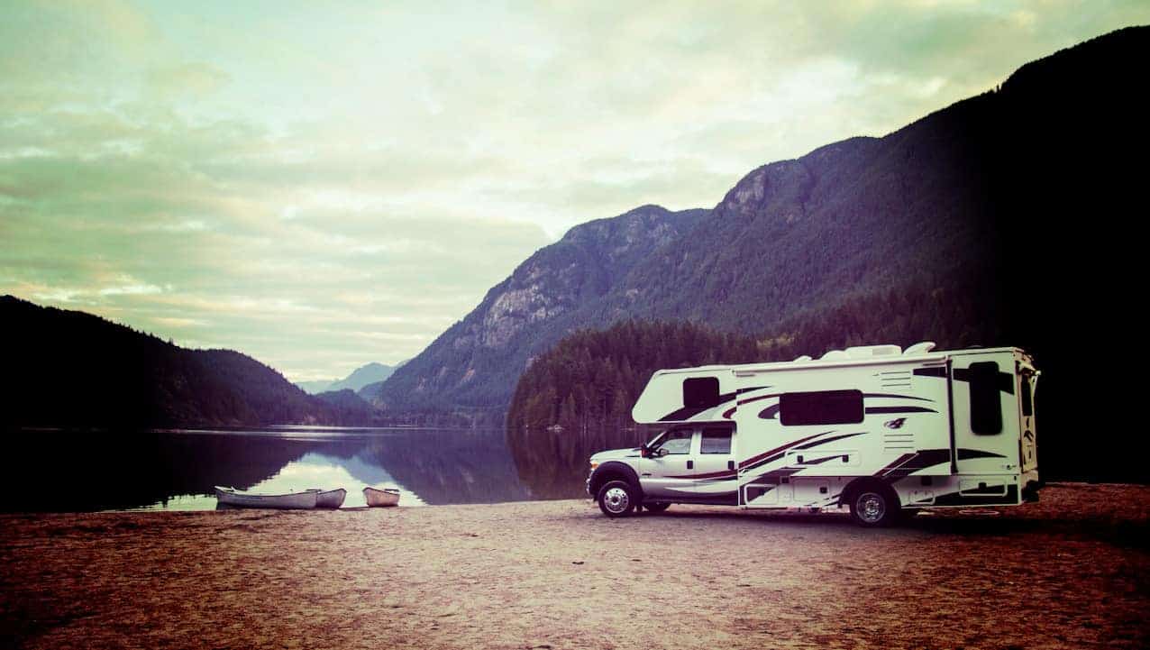 Image of RV next to lake