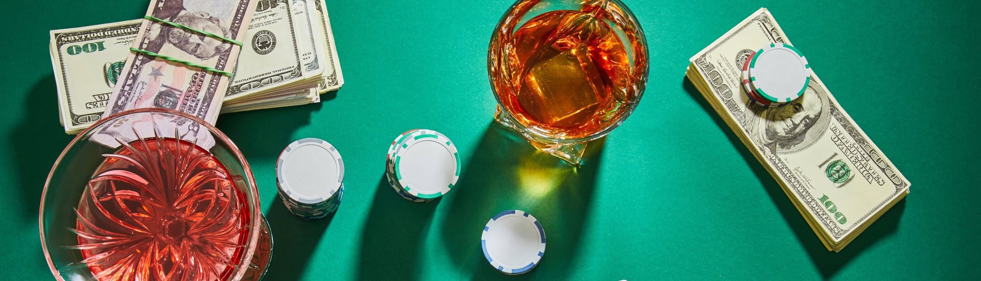 Gambling: Glasses Of Cognac Stacks Of Cash And Casino Chips